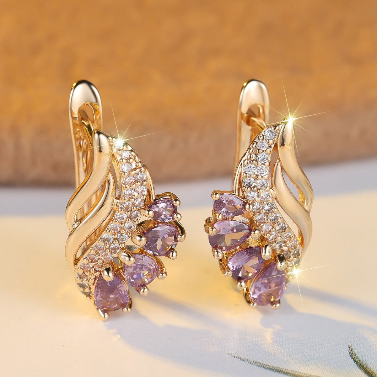 Nyvella Violet Feather Earrings | Rose Gold