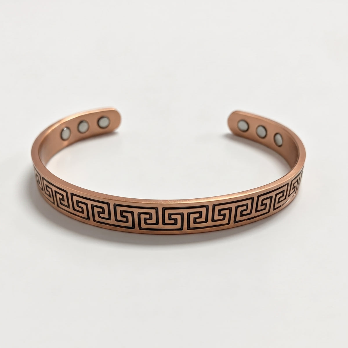 Pulsera de cobre con diseño de grecas