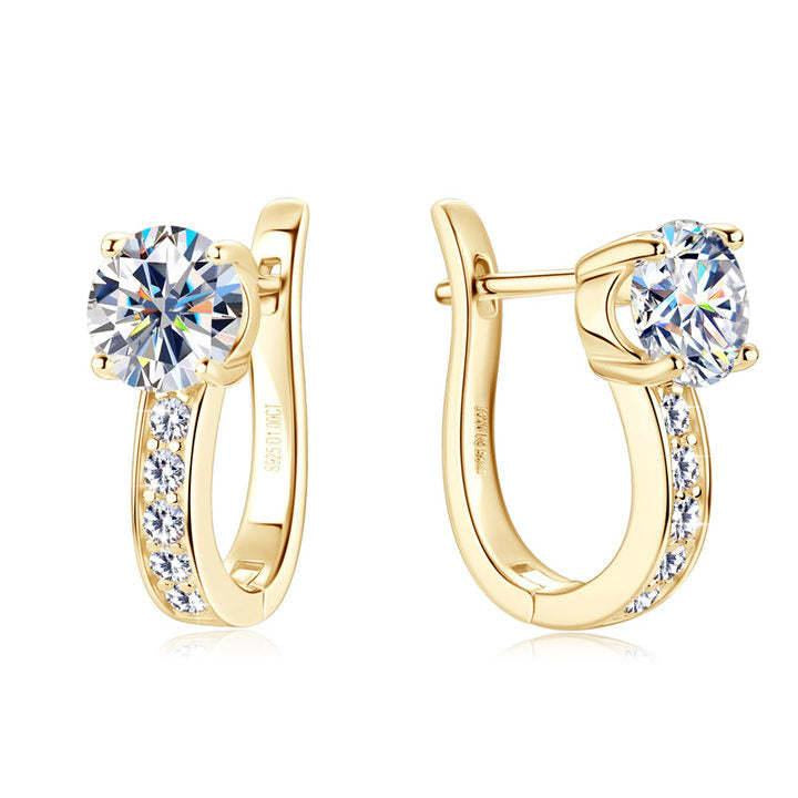 Channel Huggie Earrings in gold, close-up showing the craftsmanship